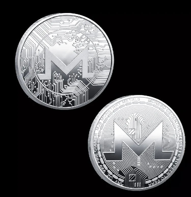 Colección de monedas criptográficas físicas de metal con estuche de plástico.