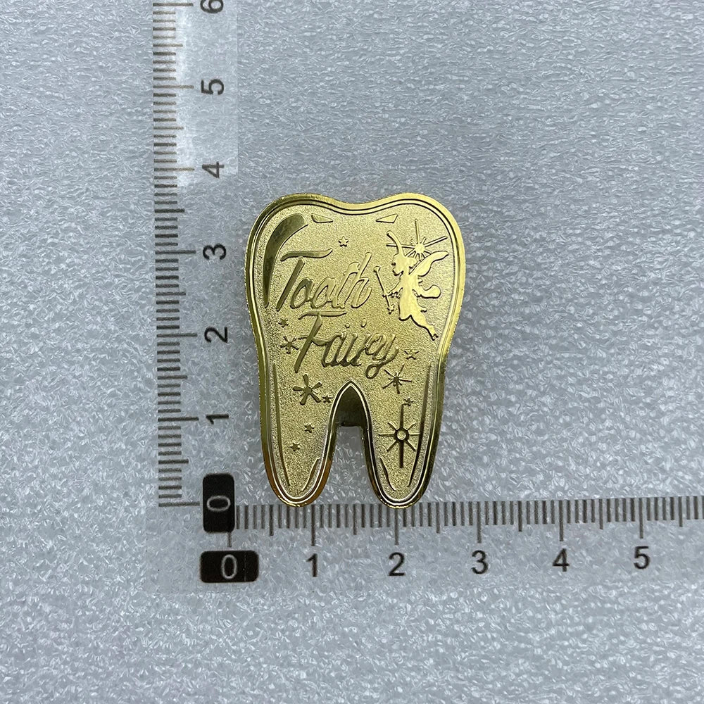 Goldener Zahn – Sammlermünze aus Metall